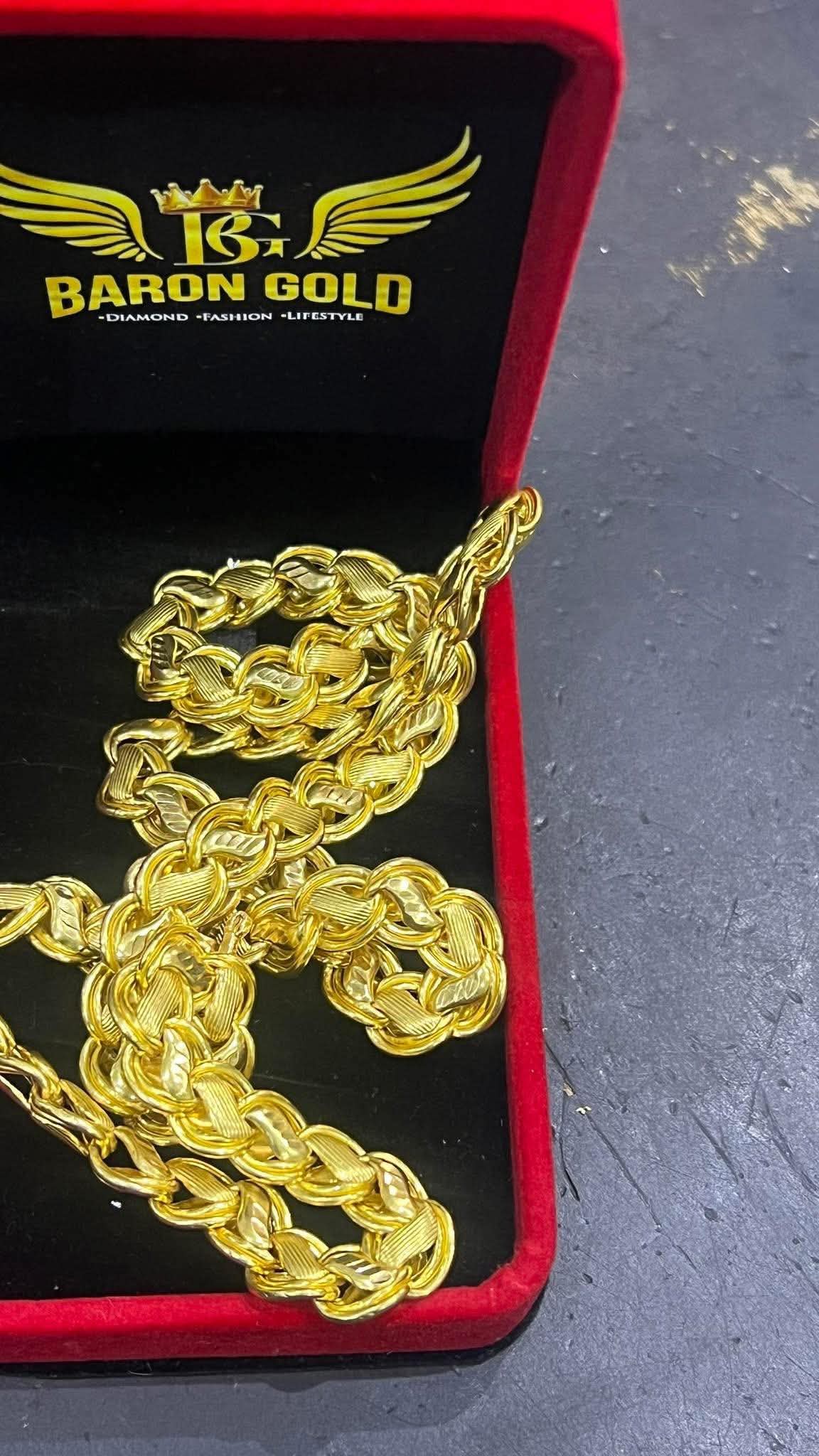 Baron Gold branded box with a gold rope chain