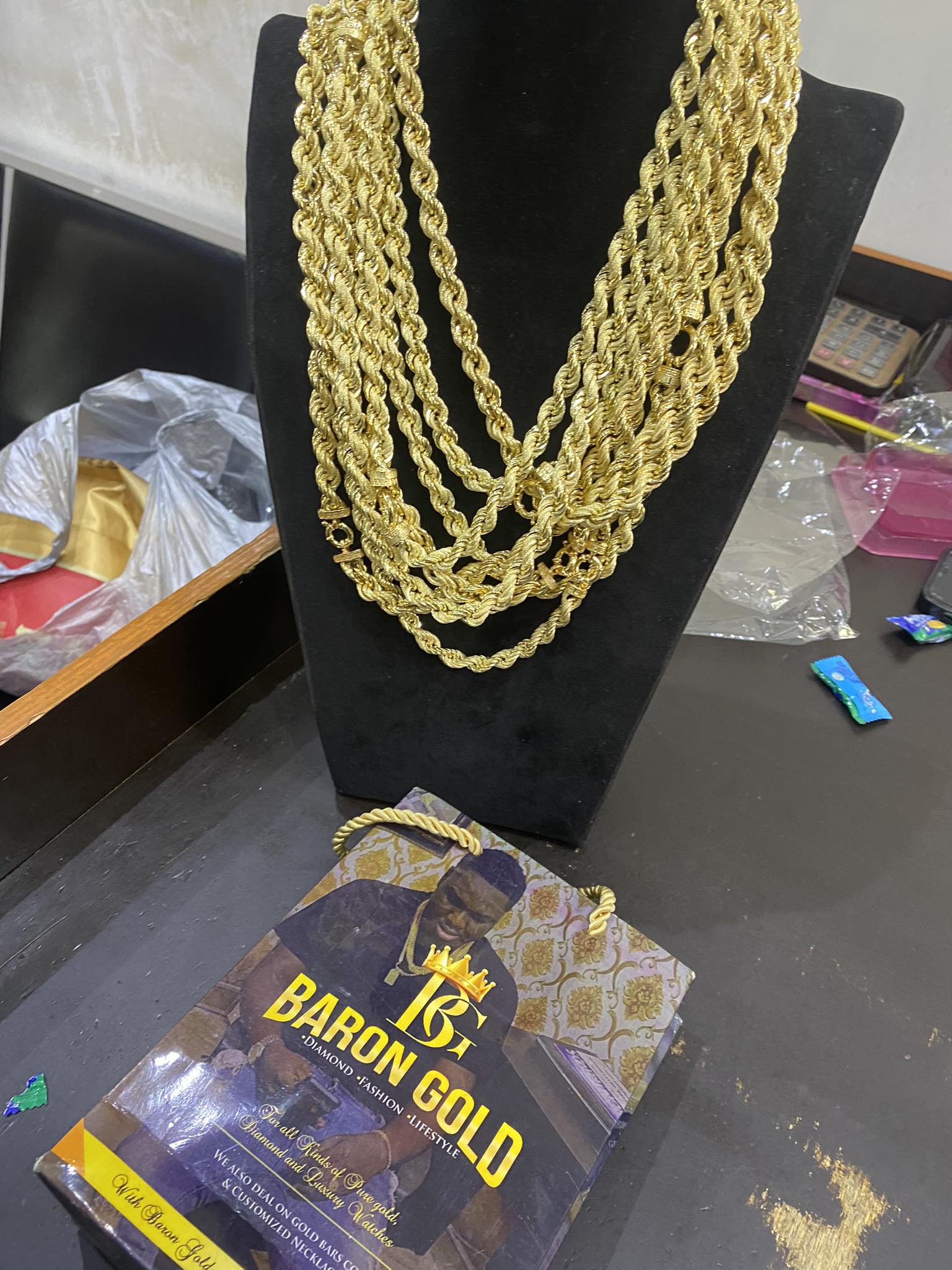 Rope chains on display bust